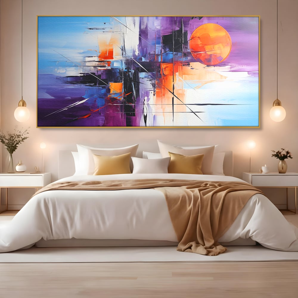 Tablou canvas cu pictura abstracta cu soare portocaliu, in rama de aluminiu auriu, pe perete intr-un dormitor